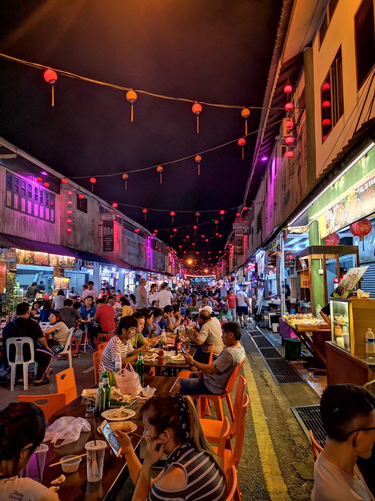 People are enjoying food at Siniawan Night Market